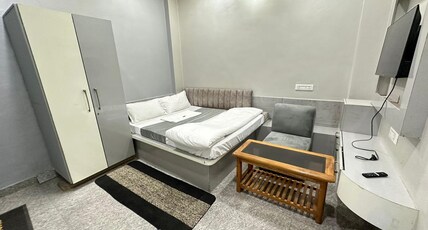 HOTEL PRAKASH Room Type - STANDARD ROOM WITH COZY BED