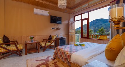 Mary Chalet Room Type - mountian view room ground floor with balcony and lawn 