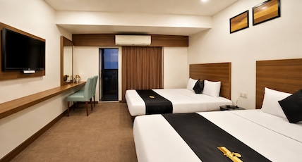 Saish Hotel Room Type - 4 Bedded AC Family Room (Quadruple Room) Saish Hotel Room Type - 4 Bedded AC Family Room (Quadruple Room)