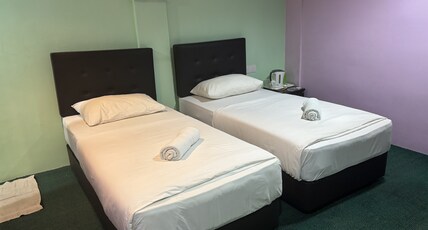 Hotel O Peneka Inn Room Type - Deluxe Twin