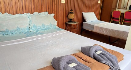 Collection O Banwiang Guesthouse Room Type - Standard Triple