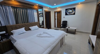 HOTEL SINDHUKANYA Room Type - Premium Super Deluxe with partial sea view