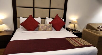 Omang Hotel & Banquets Room Type - Deluxe room