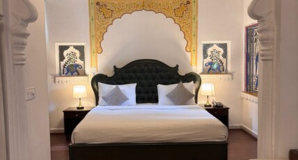 SWAROOP VILAS - LAKE FACING BOUTIQUE HOTEL Room Type - Elephanta Lake view suite with balcony