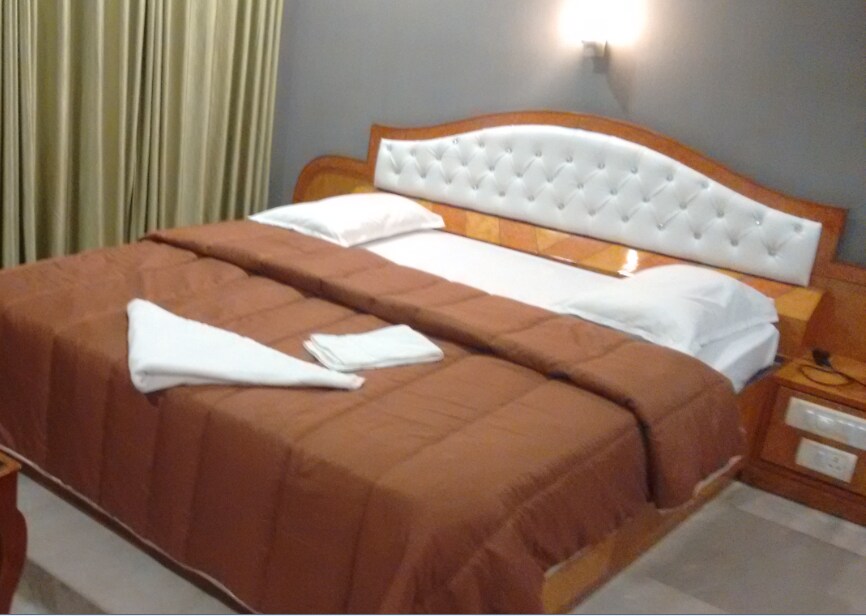 Hotel Sai International - Tap to explore photos