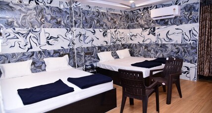 GPG RESIDENCY (GURUPADUKA GRAND RESIDENCY ) Room Type - Quadruple Room Non AC