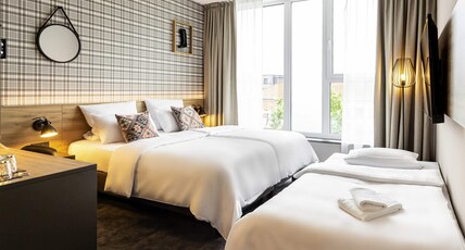Ibis Styles Vechta Room Type - Family room with 1 double bed and 1 sofa bed, new sleep comfort concept