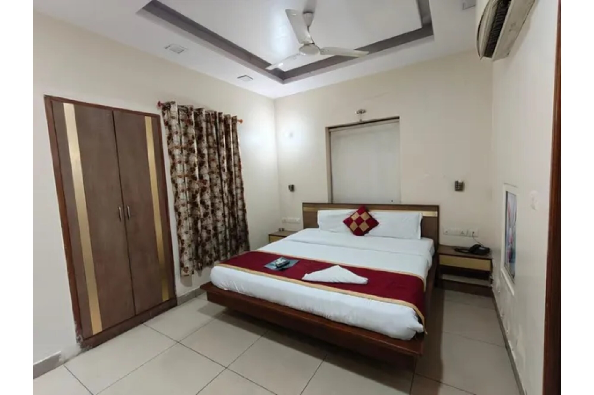 FabHotel Satyam Inn - Tap to explore photos