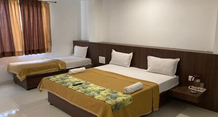 HOTEL SAI GANGOTRI Room Type - Standard Triple Bed Non Ac Room HOTEL SAI GANGOTRI Room Type - Standard Triple Bed Non Ac Room