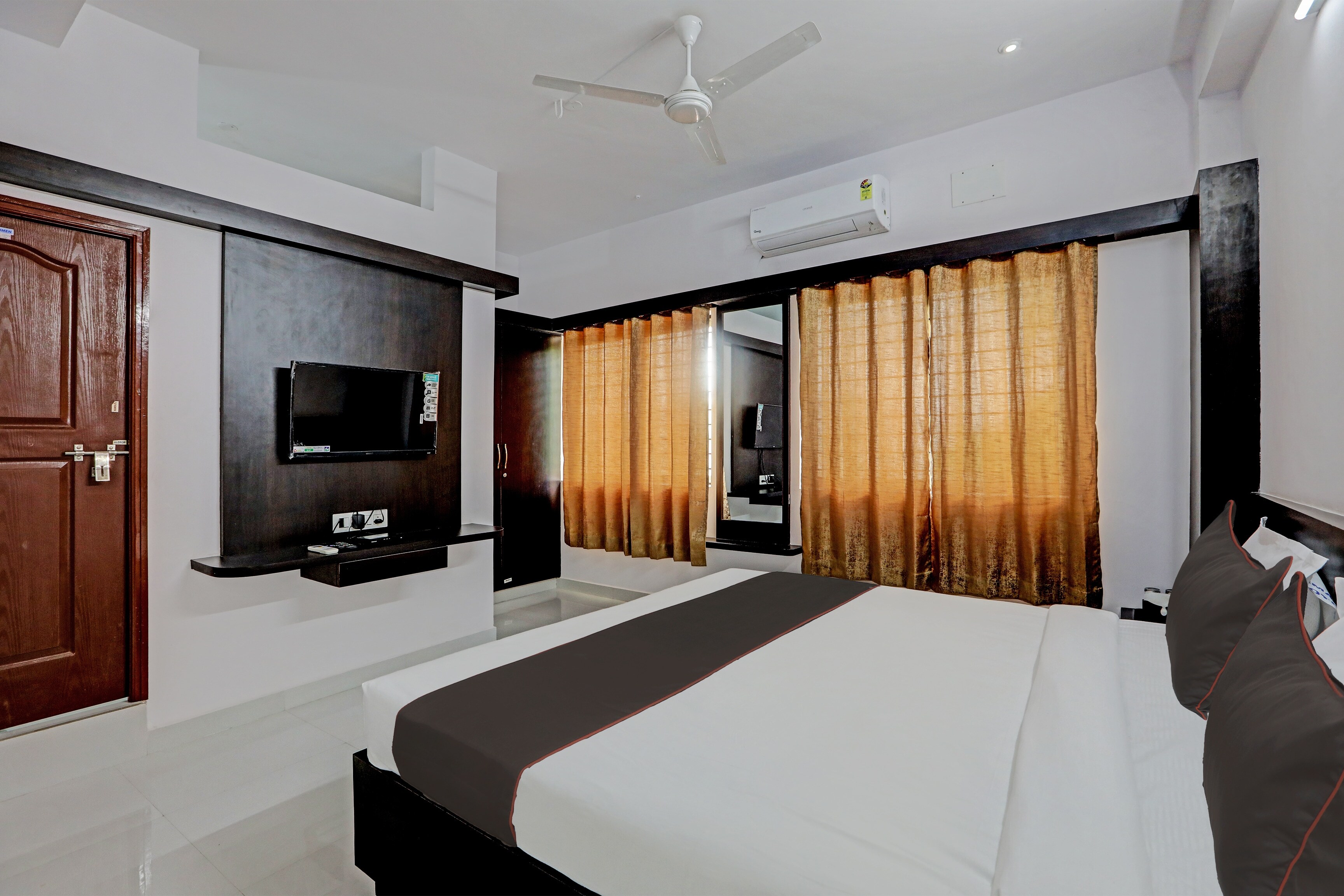 Hotel O Easy Stay Mysore - Tap to explore photos