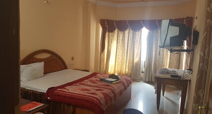 Parul palace Room Type - AC DELUXE
