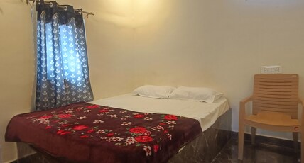 SRI HANUMA RESIDENCY Room Type - Bedroom 1