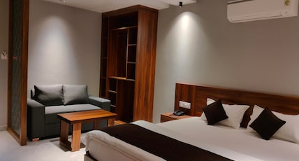 Nandvilas Hotel Room Type - King Family Room with Hill View Nandvilas Hotel Room Type - King Family Room with Hill View