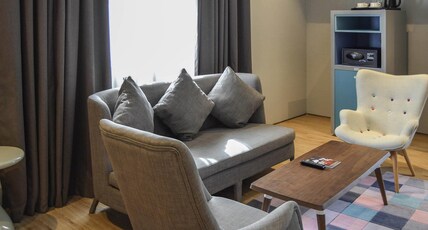 Ibis Styles Jumeirah, Bur Dubai Room Type - Suite Room with two separate single beds and li ving room