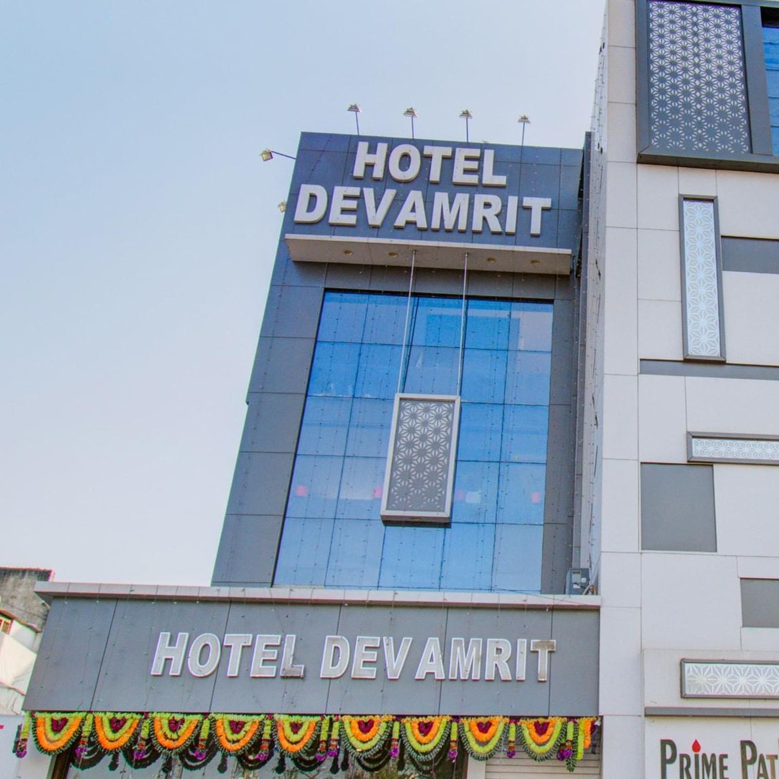 Hotel Devamrit - Tap to explore photos