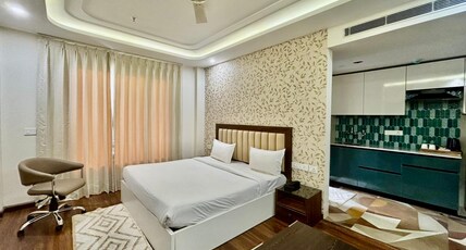 QuickIn Stayz by Rupali Homes Room Type - Luxury Room with Kitchenette and Balcony