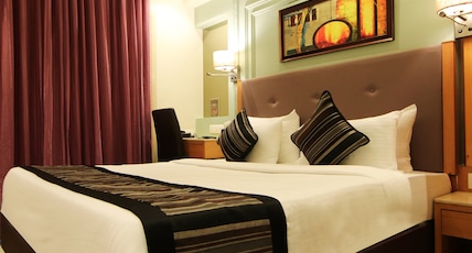 Hotel Cliffton Room Type - Deluxe King Bed Room Hotel Cliffton Room Type - Deluxe King Bed Room