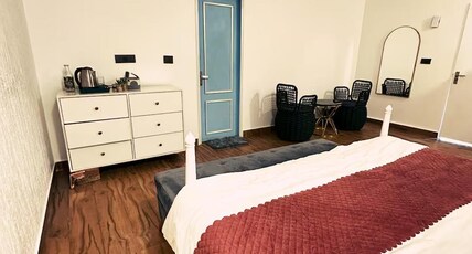 Simhayanas Suites Room Type - Deluxe Rooms