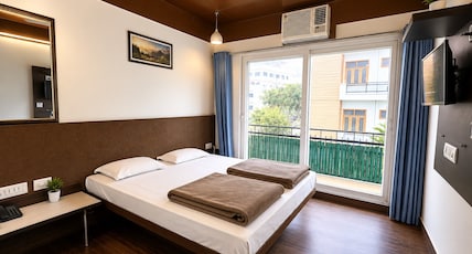 Hotel Moksha (500m From Ram Jhula) Room Type - Zen Room with Balcony Hotel Moksha (500m From Ram Jhula) Room Type - Zen Room with Balcony