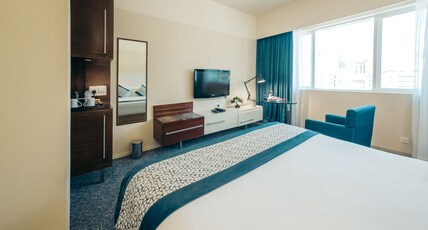 Kingsgate Hotel by Millennium Room Type - Deluxe Room with One King Bed Kingsgate Hotel by Millennium Room Type - Deluxe Room with One King Bed