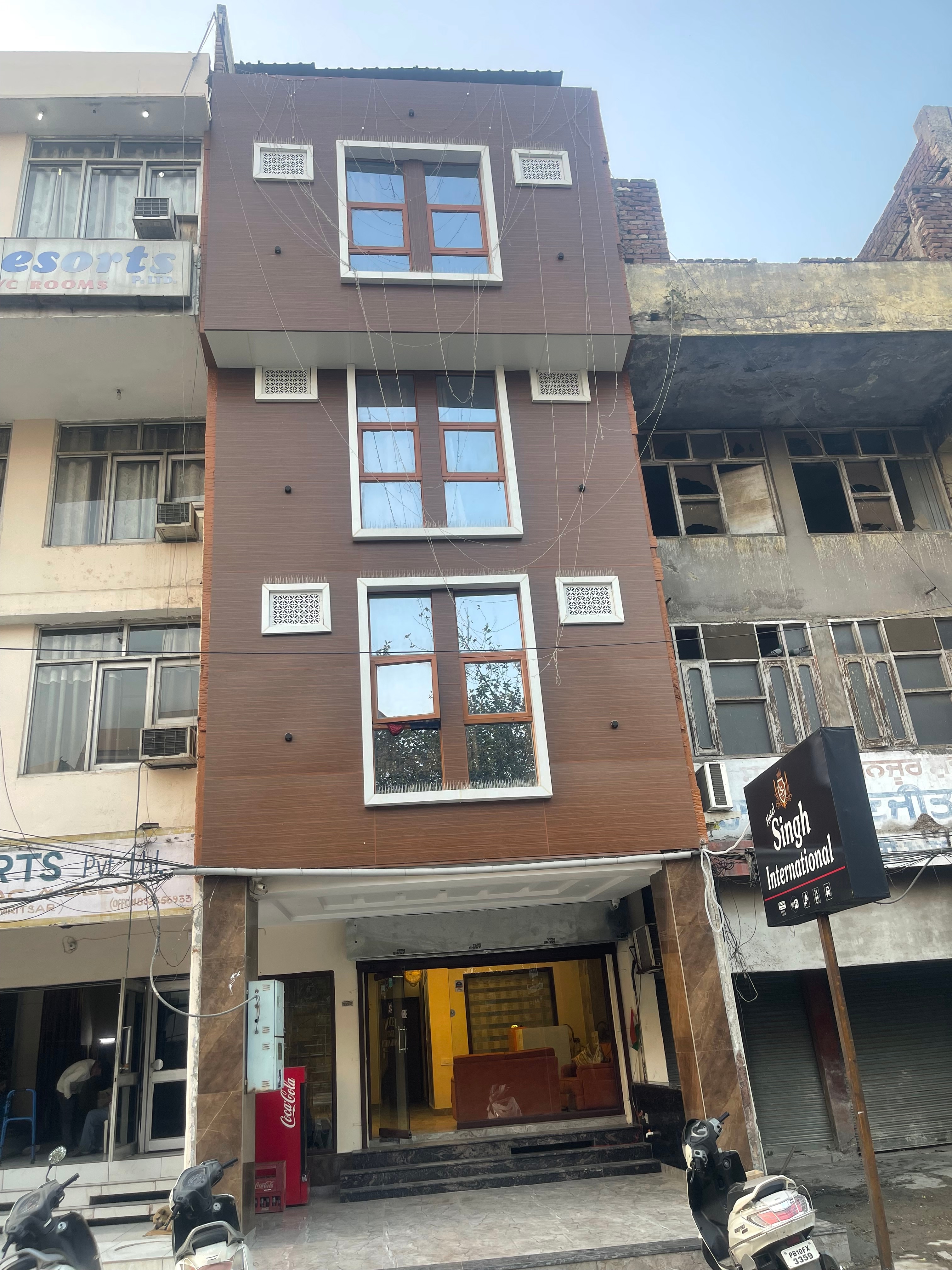 Hotel Singh International - Tap to explore photos