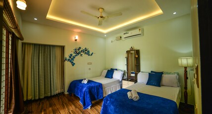 Amritham Holidays | Rooms & Wi-Fi Room Type - Family Room with kitchenatte