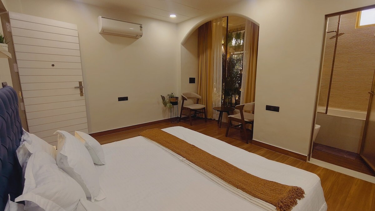 The Nest: Elegant & Private Luxury 2 BHK - Tap to explore photos