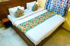 Elite Suites by Amisha Palace | Near Station