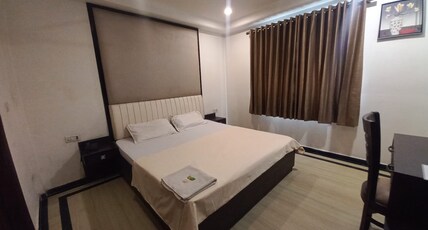 Hotel Sagar, by GRB Room Type - Deluxe Room
