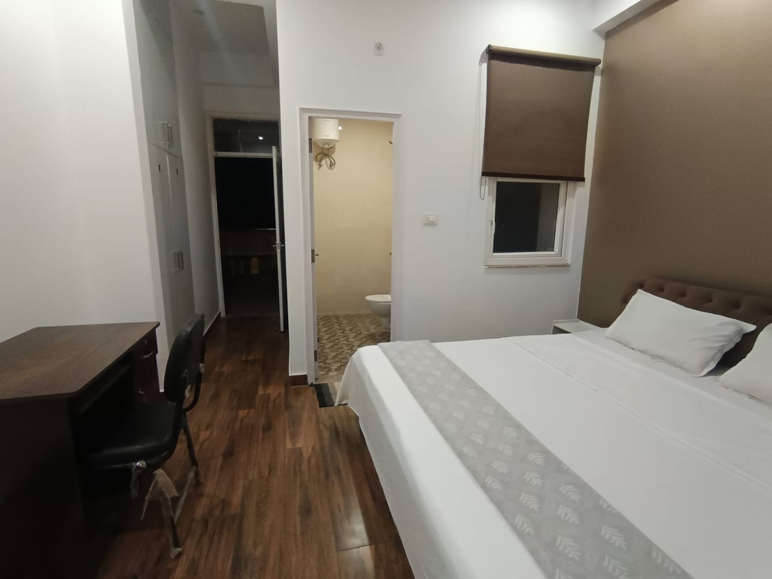 Premium AC Double Room - Tap to explore photos