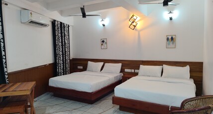 JK Residency Kunnamangalam Room Type - Deluxe Quad Room