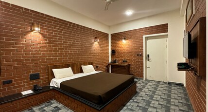 RED BRICKS INN Room Type - PREMIUM ROOM NON AC With Balcony