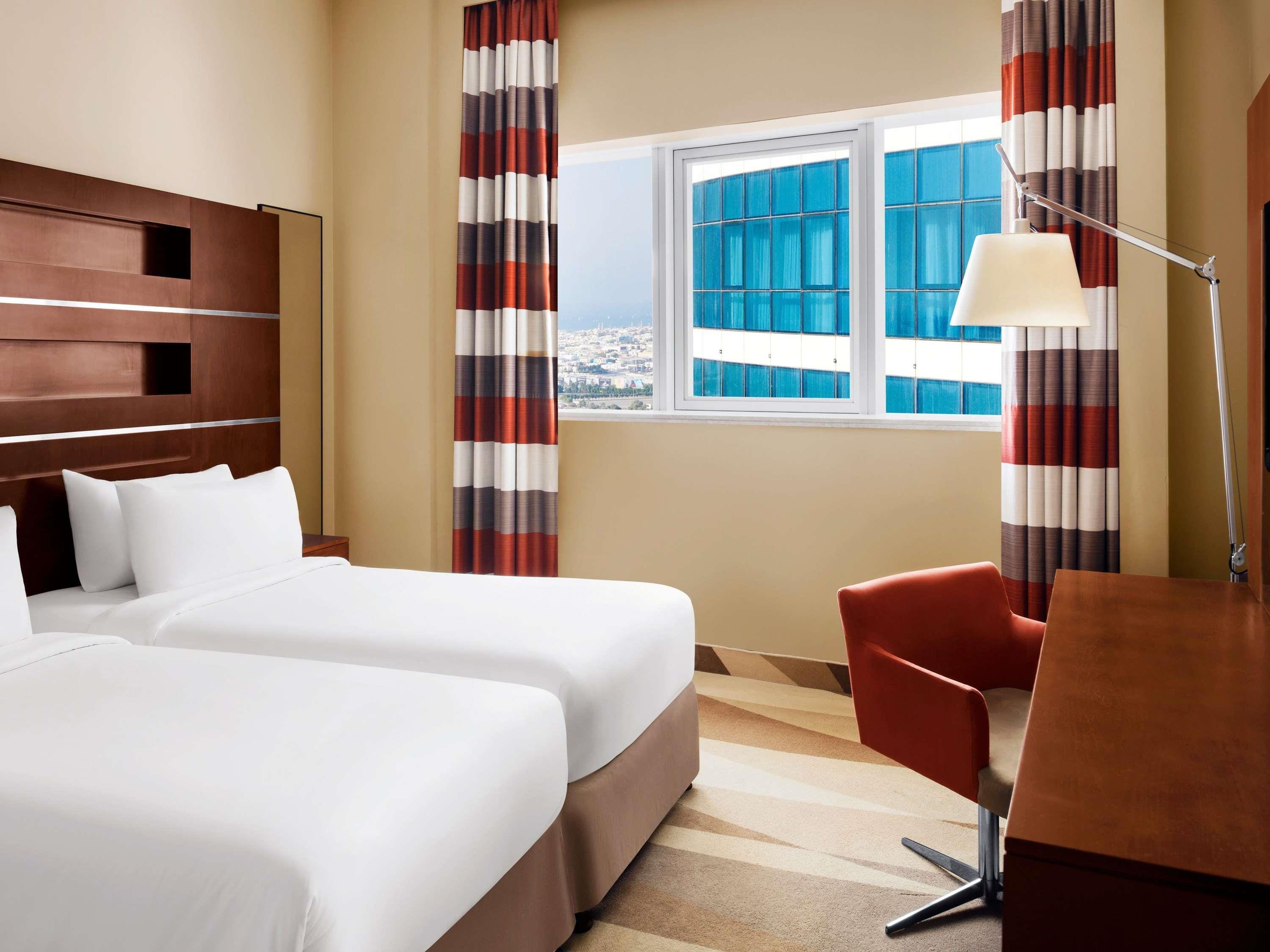 Novotel Dubai Al Barsha - Tap to explore photos