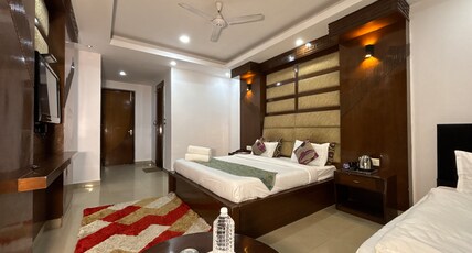 Hotel Raj Mandir Room Type - Platinum Suite Triple bed Room (Mansa Devi Rope way View, Hygienic Suite Triple Bed Room)