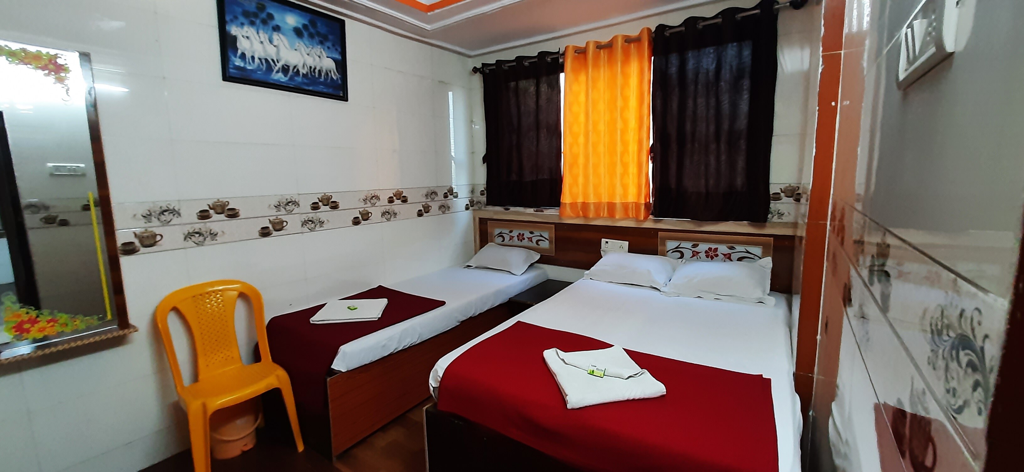 Hotel Sai Laxmi - Tap to explore photos