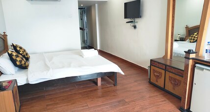 Tridev Hotel Room Type - Deluxe Room with Hill View