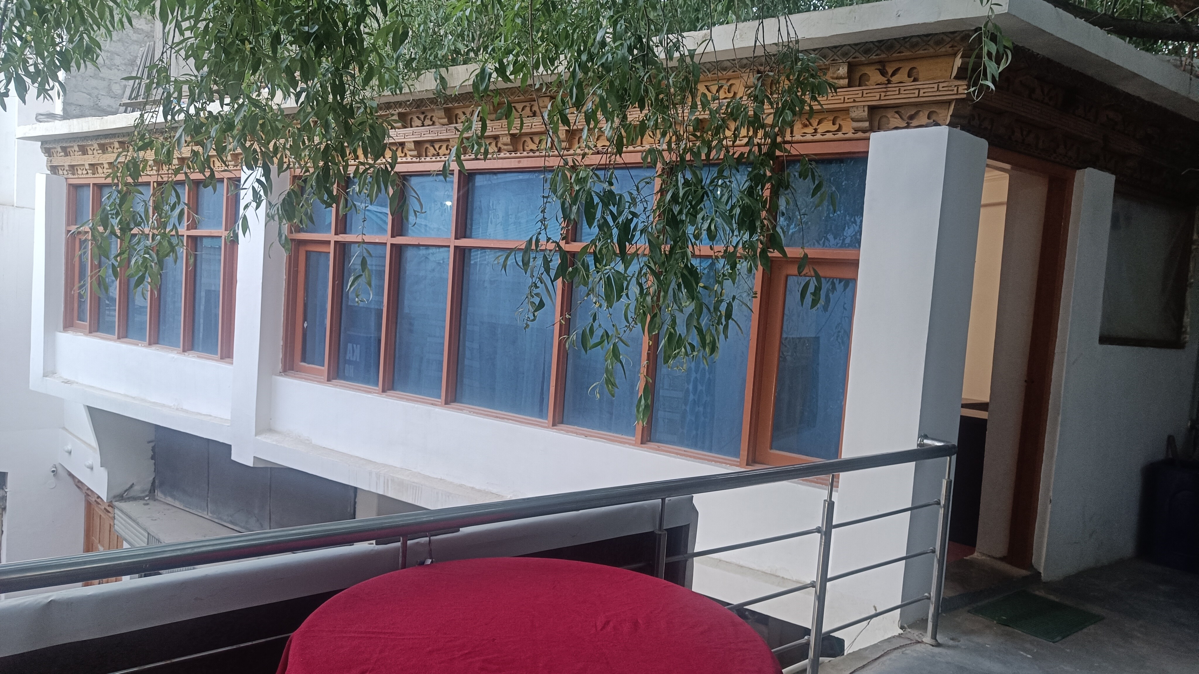 New International Guest House - Tap to explore photos