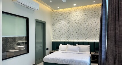 Hotel Sumedha Room Type - Deluxe Room