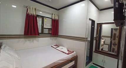 SHIVPOOJA FAMILY LODGE AND RESTAURANT Room Type - Deluxe AC Room SHIVPOOJA FAMILY LODGE AND RESTAURANT Room Type - Deluxe AC Room