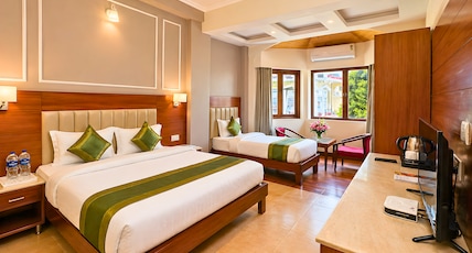 juSTa Riverside Resort Srinagar Room Type - Superior Triple Room - Garden Access juSTa Riverside Resort Srinagar Room Type - Superior Triple Room - Garden Access