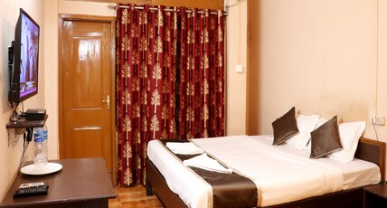 Om Shree Cottage Room Type - Deluxe Room With AC and Unlimited WIFI