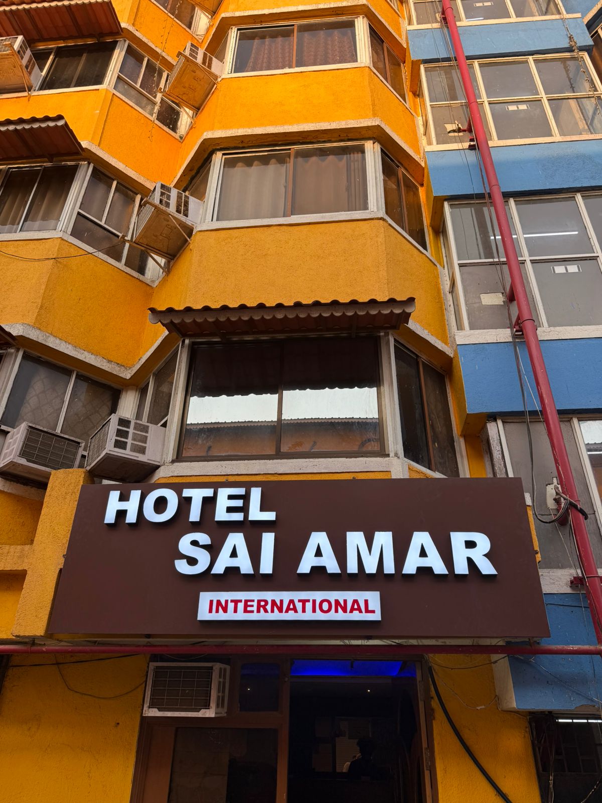 Hotel Sai Amar International - Tap to explore photos