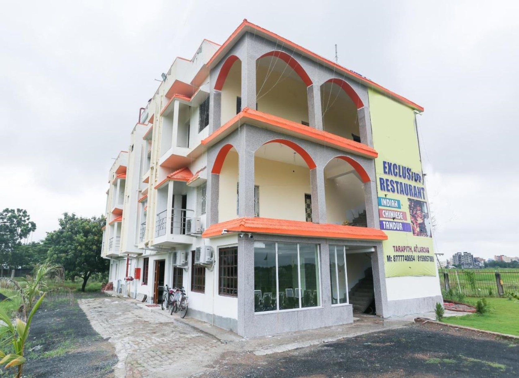 Puja International Hotel - Tap to explore photos
