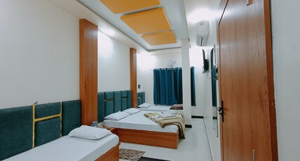 Hotel Shreem, Ujjain Room Type - Standard 4 Bed Room | 1 Double + 2 Single Beds | Non Ac