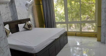 Hotel O POP A Happy Hours Plaza Room Type - Classic