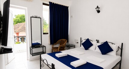 Sunpark | 6 Mins walk to Baga Beach | Resort-Style Pool & Apartments Room Type - 1 BH Deluxe with Balcony And Pool Sunpark | 6 Mins walk to Baga Beach | Resort-Style Pool & Apartments Room Type - 1 BH Deluxe with Balcony And Pool