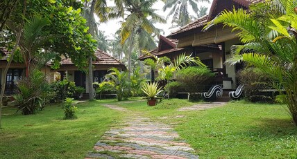 Maadathil Cottages & Beach Resort Room Type - Deluxe Cottages with AC
