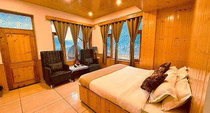 Wander Thrives iNN by ADS (A unit of White Petals) Room Type - Elite Retreat ( Executive Room with Valley View Balcony )
