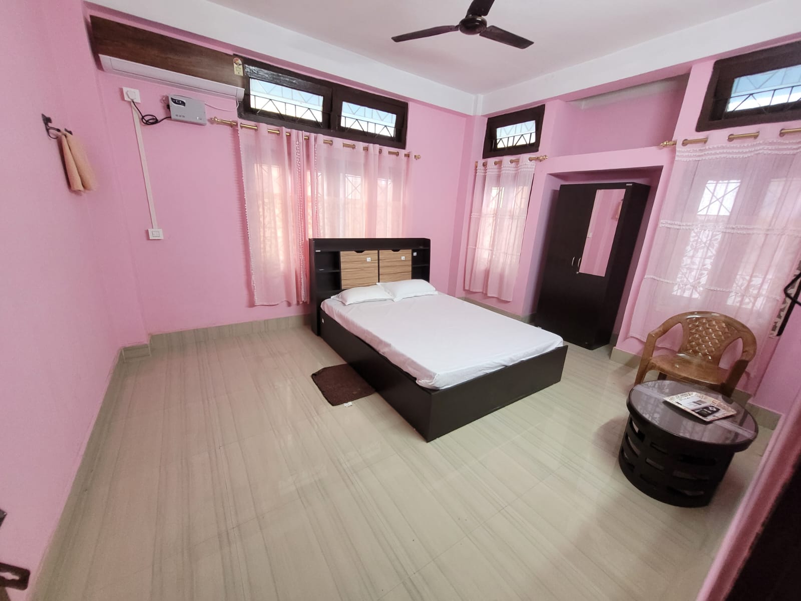 Delight Apartment Khanapara | Room With PRivate Kitchen - Tap to explore photos