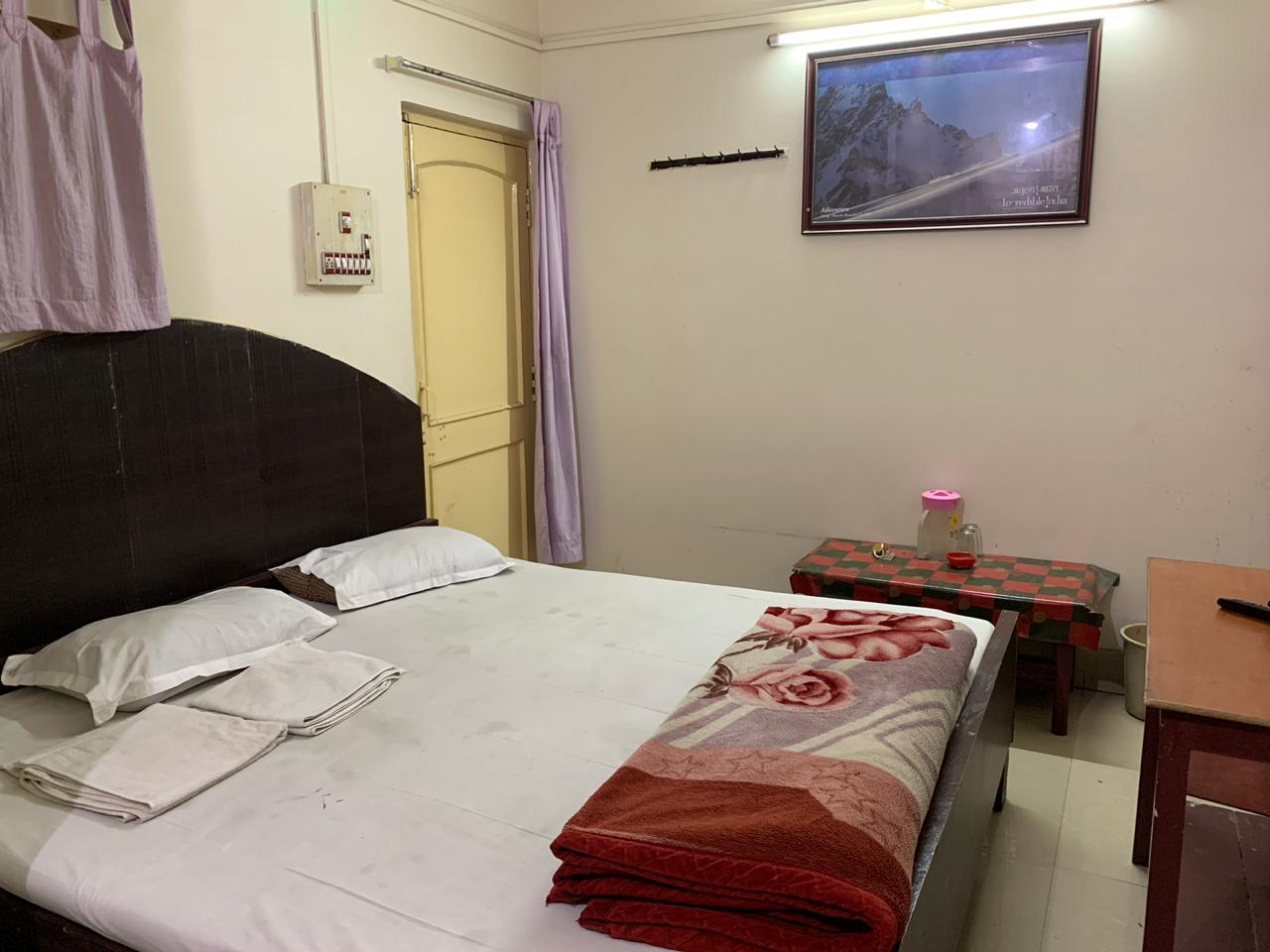 Hotel New Akash  - Tap to explore photos
